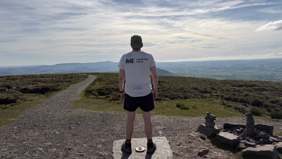 Fell The Original Tee full fit on a summit trig point