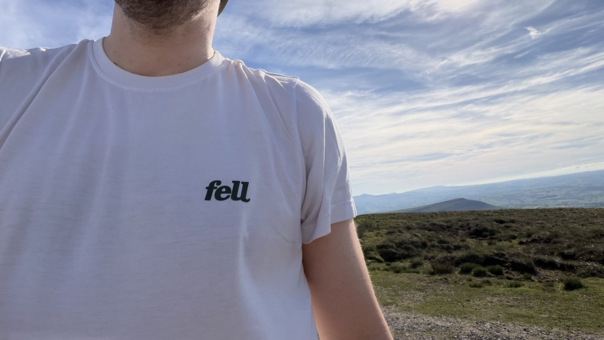Fell The Original Tee front chest logo on a Brecon Beacons summit